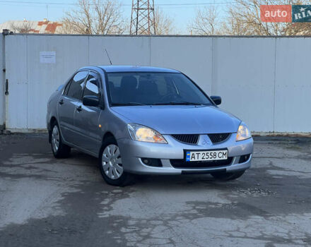Сірий Міцубісі Lancer, об'ємом двигуна 1.6 л та пробігом 320 тис. км за 3650 $, фото 1 на Automoto.ua