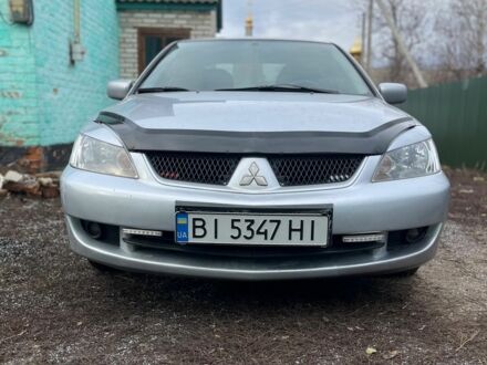 Сірий Міцубісі Lancer, об'ємом двигуна 1.6 л та пробігом 296 тис. км за 4500 $, фото 1 на Automoto.ua