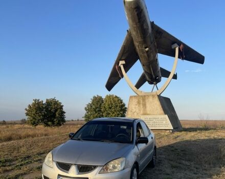 Серый Мицубиси Лансер, объемом двигателя 1.6 л и пробегом 340 тыс. км за 1564 $, фото 1 на Automoto.ua