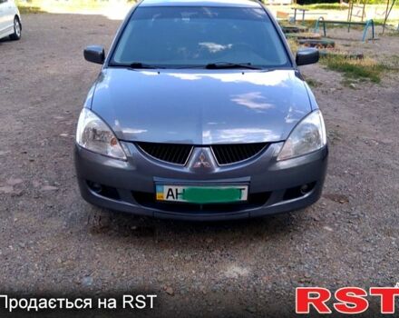 Серый Мицубиси Лансер, объемом двигателя 1.6 л и пробегом 0 тыс. км за 4350 $, фото 1 на Automoto.ua