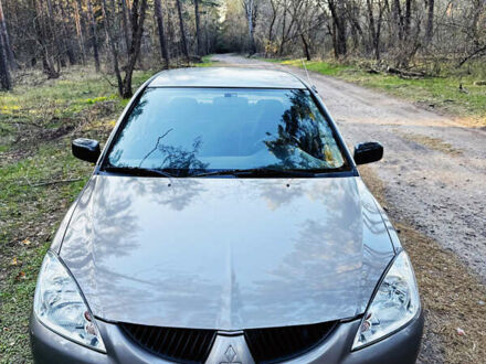 Міцубісі Lancer 2004 у Києві на Automoto.ua Сірий Міцубісі Lancer, об'ємом двигуна 1.3 л та пробігом 310 тис. км за 2700 $, фото 1 на Automoto.ua