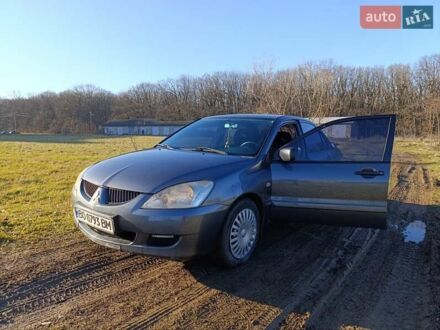 Міцубісі Lancer 2004 у Новодністровськ на Automoto.ua Сірий Міцубісі Lancer, об'ємом двигуна 1.58 л та пробігом 390 тис. км за 3800 $, фото 1 на Automoto.ua