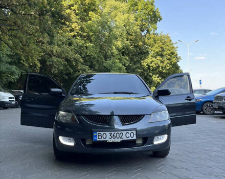 Сірий Міцубісі Lancer, об'ємом двигуна 1.58 л та пробігом 300 тис. км за 3800 $, фото 1 на Automoto.ua