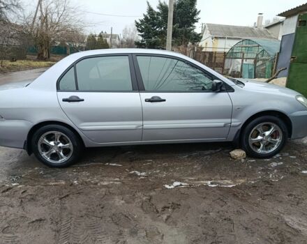 Серый Мицубиси Лансер, объемом двигателя 1.6 л и пробегом 280 тыс. км за 4000 $, фото 1 на Automoto.ua