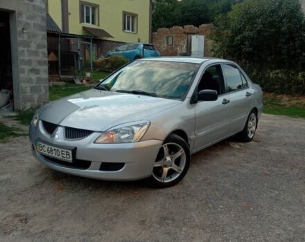 Сірий Міцубісі Lancer, об'ємом двигуна 1.6 л та пробігом 308 тис. км за 4100 $, фото 1 на Automoto.ua