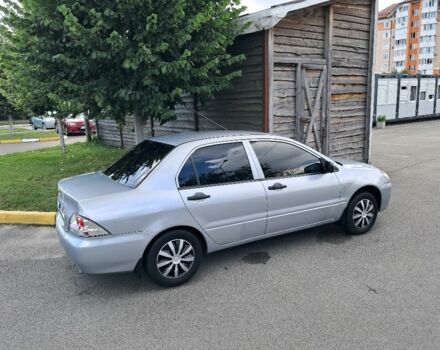 Серый Мицубиси Лансер, объемом двигателя 1.3 л и пробегом 280 тыс. км за 3700 $, фото 1 на Automoto.ua