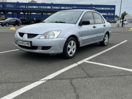 Міцубісі Lancer 2004 у Києві на Automoto.ua Сірий Міцубісі Lancer, об'ємом двигуна 1.6 л та пробігом 230 тис. км за 2600 $, фото 1 на Automoto.ua