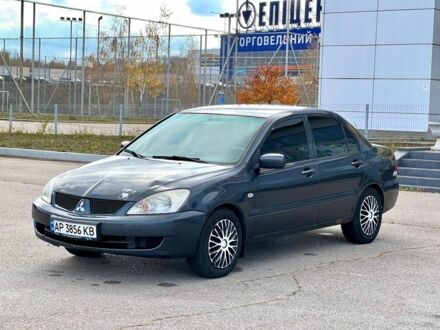 Серый Мицубиси Лансер, объемом двигателя 1.6 л и пробегом 490 тыс. км за 1799 $, фото 1 на Automoto.ua