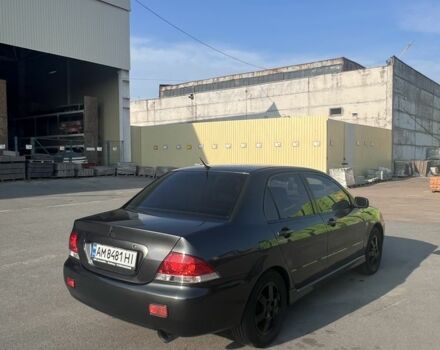Сірий Міцубісі Lancer, об'ємом двигуна 1.6 л та пробігом 260 тис. км за 4200 $, фото 1 на Automoto.ua