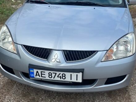 Серый Мицубиси Лансер, объемом двигателя 1.6 л и пробегом 289 тыс. км за 3150 $, фото 1 на Automoto.ua