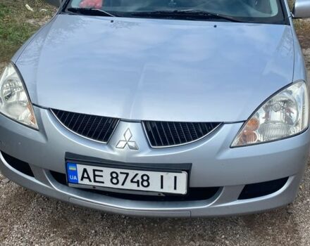 Серый Мицубиси Лансер, объемом двигателя 1.6 л и пробегом 289 тыс. км за 3150 $, фото 1 на Automoto.ua