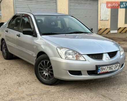 Сірий Міцубісі Lancer, об'ємом двигуна 1.58 л та пробігом 121 тис. км за 4900 $, фото 1 на Automoto.ua