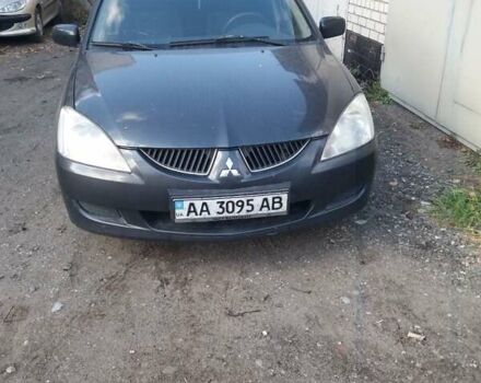 Серый Мицубиси Лансер, объемом двигателя 1.58 л и пробегом 531 тыс. км за 2828 $, фото 1 на Automoto.ua