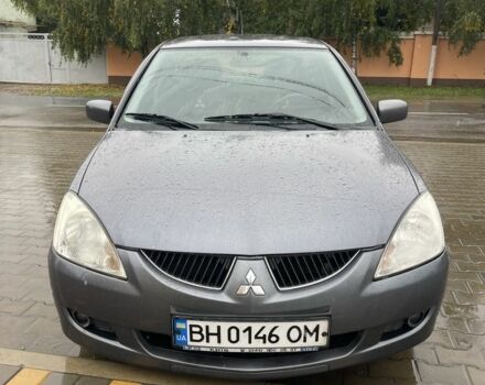 Сірий Міцубісі Lancer, об'ємом двигуна 1.6 л та пробігом 259 тис. км за 4600 $, фото 1 на Automoto.ua