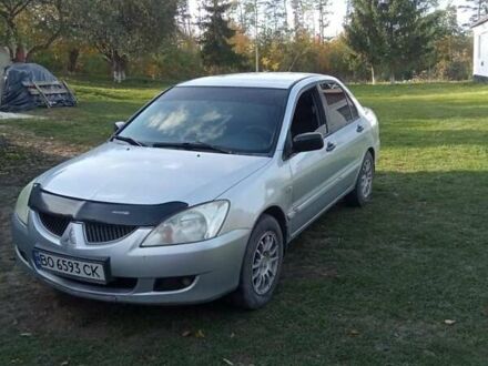 Міцубісі Lancer 2004 у Тернополі на Automoto.ua Сірий Міцубісі Lancer, об'ємом двигуна 1.6 л та пробігом 244 тис. км за 4000 $, фото 1 на Automoto.ua