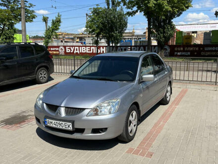 Сірий Міцубісі Lancer, об'ємом двигуна 1.6 л та пробігом 210 тис. км за 4500 $, фото 1 на Automoto.ua