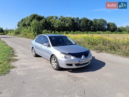 Міцубісі Lancer 2004 у Ямполе на Automoto.ua Сірий Міцубісі Lancer, об'ємом двигуна 1.58 л та пробігом 270 тис. км за 3800 $, фото 1 на Automoto.ua