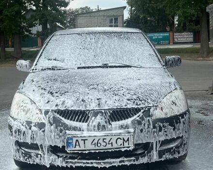 Серый Мицубиси Лансер, объемом двигателя 1.58 л и пробегом 290 тыс. км за 2300 $, фото 1 на Automoto.ua