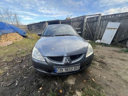 Сірий Міцубісі Lancer, об'ємом двигуна 1.6 л та пробігом 200 тис. км за 2400 $, фото 1 на Automoto.ua