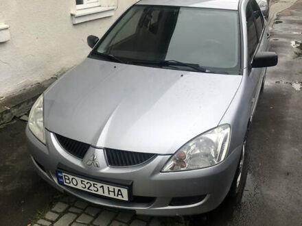 Міцубісі Lancer 2004 у Тернополі на Automoto.ua Сірий Міцубісі Lancer, об'ємом двигуна 1.58 л та пробігом 265 тис. км за 3850 $, фото 1 на Automoto.ua