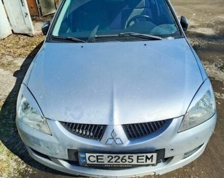 Сірий Міцубісі Lancer, об'ємом двигуна 1.58 л та пробігом 445 тис. км за 2900 $, фото 1 на Automoto.ua