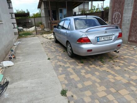 Мицубиси Лансер 2004 в Черноморске (Ильичевске) на Automoto.ua Серый Мицубиси Лансер, объемом двигателя 1.6 л и пробегом 250 тыс. км за 3500 $, фото 1 на Automoto.ua