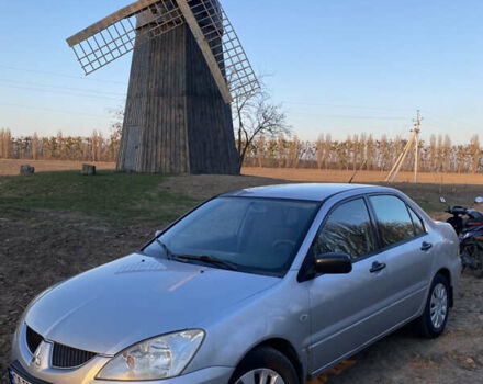 Сірий Міцубісі Lancer, об'ємом двигуна 1.6 л та пробігом 375 тис. км за 3550 $, фото 1 на Automoto.ua