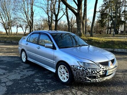 Сірий Міцубісі Lancer, об'ємом двигуна 2 л та пробігом 240 тис. км за 4200 $, фото 1 на Automoto.ua