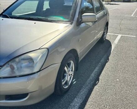 Сірий Міцубісі Lancer, об'ємом двигуна 1.3 л та пробігом 245 тис. км за 3500 $, фото 1 на Automoto.ua