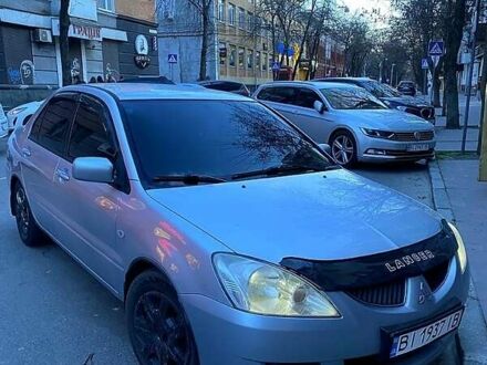 Сірий Міцубісі Lancer, об'ємом двигуна 1.6 л та пробігом 380 тис. км за 4600 $, фото 1 на Automoto.ua