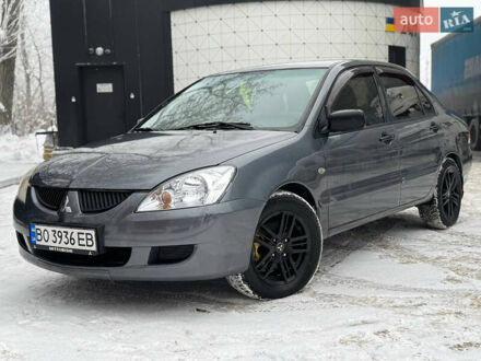 Сірий Міцубісі Lancer, об'ємом двигуна 1.58 л та пробігом 300 тис. км за 3300 $, фото 1 на Automoto.ua