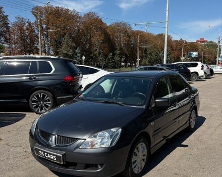Сірий Міцубісі Lancer, об'ємом двигуна 1.58 л та пробігом 174 тис. км за 4500 $, фото 1 на Automoto.ua