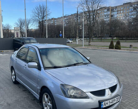 Сірий Міцубісі Lancer, об'ємом двигуна 2 л та пробігом 200 тис. км за 3450 $, фото 1 на Automoto.ua