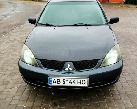 Сірий Міцубісі Lancer, об'ємом двигуна 1.6 л та пробігом 265 тис. км за 2600 $, фото 1 на Automoto.ua