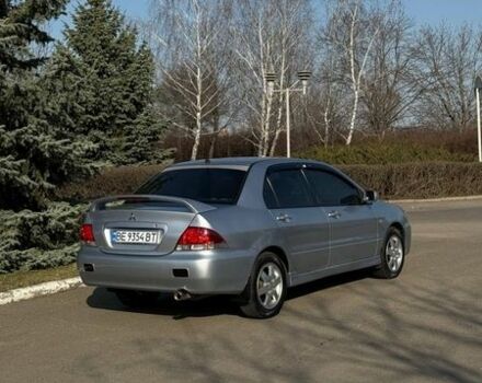 Серый Мицубиси Лансер, объемом двигателя 1.58 л и пробегом 164 тыс. км за 4600 $, фото 1 на Automoto.ua