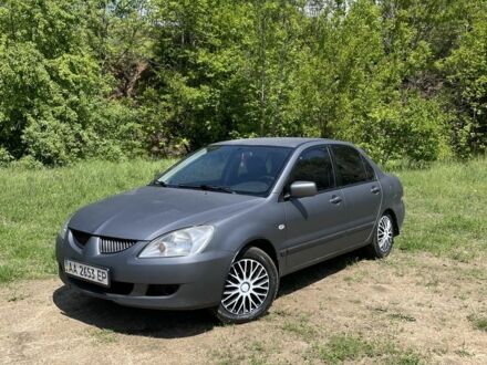 Мицубиси Лансер 2004 в Кропивницком (Кировограде) на Automoto.ua Серый Мицубиси Лансер, объемом двигателя 1.6 л и пробегом 360 тыс. км за 3499 $, фото 1 на Automoto.ua