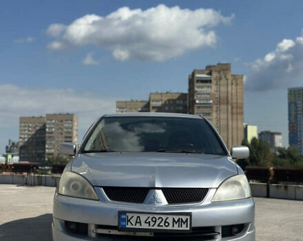 Сірий Міцубісі Lancer, об'ємом двигуна 1.58 л та пробігом 246 тис. км за 3800 $, фото 1 на Automoto.ua