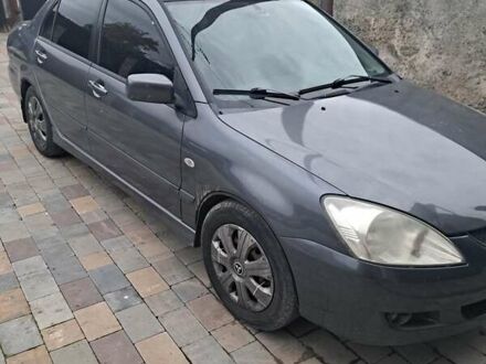 Міцубісі Lancer 2004 у Львові на Automoto.ua Сірий Міцубісі Lancer, об'ємом двигуна 1.58 л та пробігом 290 тис. км за 3900 $, фото 1 на Automoto.ua