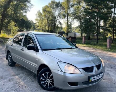 Сірий Міцубісі Lancer, об'ємом двигуна 1.3 л та пробігом 3 тис. км за 2476 $, фото 1 на Automoto.ua