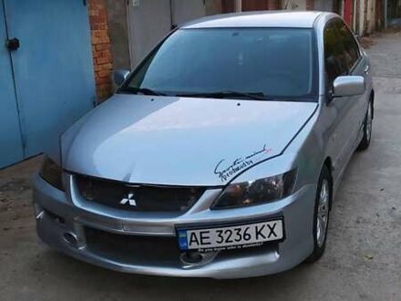 Міцубісі Lancer 2004 у Никополе на Automoto.ua Сірий Міцубісі Lancer, об'ємом двигуна 2 л та пробігом 204 тис. км за 5099 $, фото 1 на Automoto.ua
