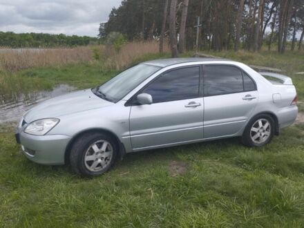 Сірий Міцубісі Lancer, об'ємом двигуна 0.16 л та пробігом 200 тис. км за 4300 $, фото 1 на Automoto.ua