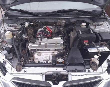 Серый Мицубиси Лансер, объемом двигателя 1.6 л и пробегом 290 тыс. км за 4000 $, фото 1 на Automoto.ua