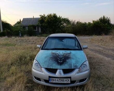 Сірий Міцубісі Lancer, об'ємом двигуна 1.58 л та пробігом 385 тис. км за 4500 $, фото 1 на Automoto.ua