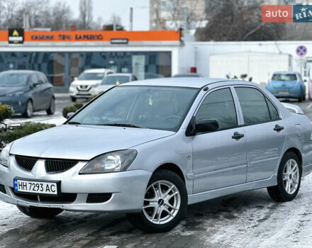 Серый Мицубиси Лансер, объемом двигателя 1.3 л и пробегом 289 тыс. км за 3699 $, фото 1 на Automoto.ua