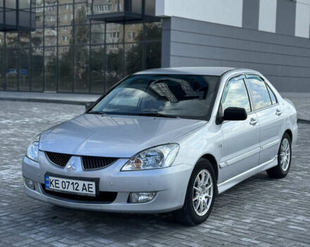 Сірий Міцубісі Lancer, об'ємом двигуна 1.6 л та пробігом 260 тис. км за 3899 $, фото 1 на Automoto.ua