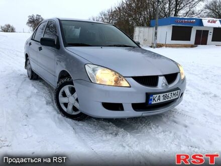 Сірий Міцубісі Lancer, об'ємом двигуна 1.3 л та пробігом 190 тис. км за 4250 $, фото 1 на Automoto.ua