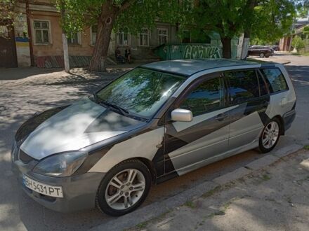 Сірий Міцубісі Lancer, об'ємом двигуна 2 л та пробігом 200 тис. км за 2850 $, фото 1 на Automoto.ua