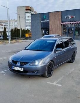 Серый Мицубиси Лансер, объемом двигателя 1.58 л и пробегом 306 тыс. км за 4300 $, фото 1 на Automoto.ua