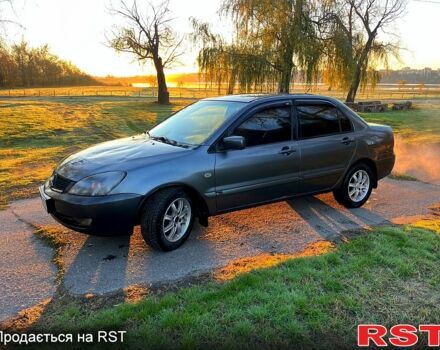 Сірий Міцубісі Lancer, об'ємом двигуна 1.6 л та пробігом 275 тис. км за 3000 $, фото 1 на Automoto.ua