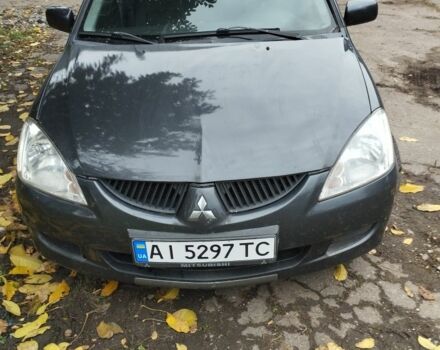 Сірий Міцубісі Lancer, об'ємом двигуна 1.6 л та пробігом 345 тис. км за 5000 $, фото 1 на Automoto.ua